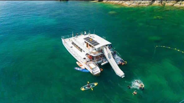 Coral Island + Sunset on a Sailing Catamaran
