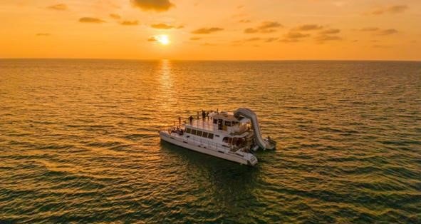 Coral Island + Sunset on a Sailing Catamaran