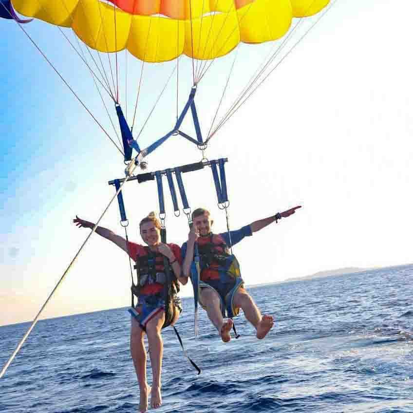 Parasailing behind a speedboat in Hurghada